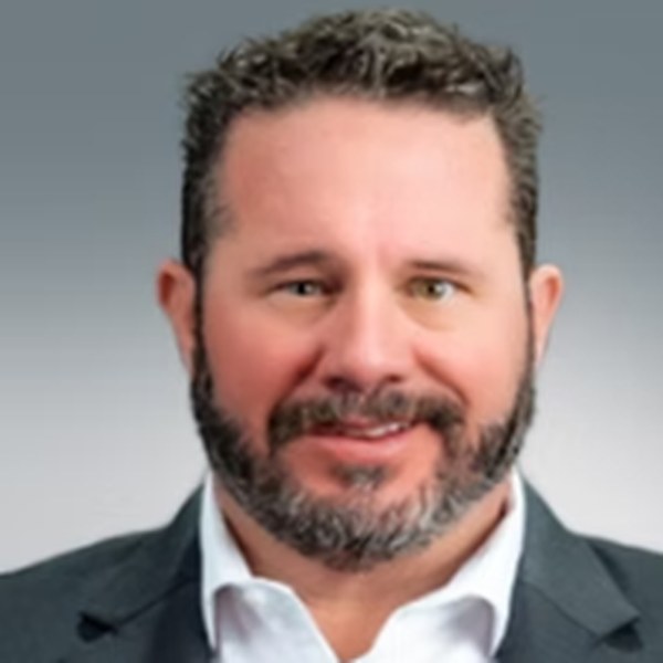 Portrait of Travis Dees